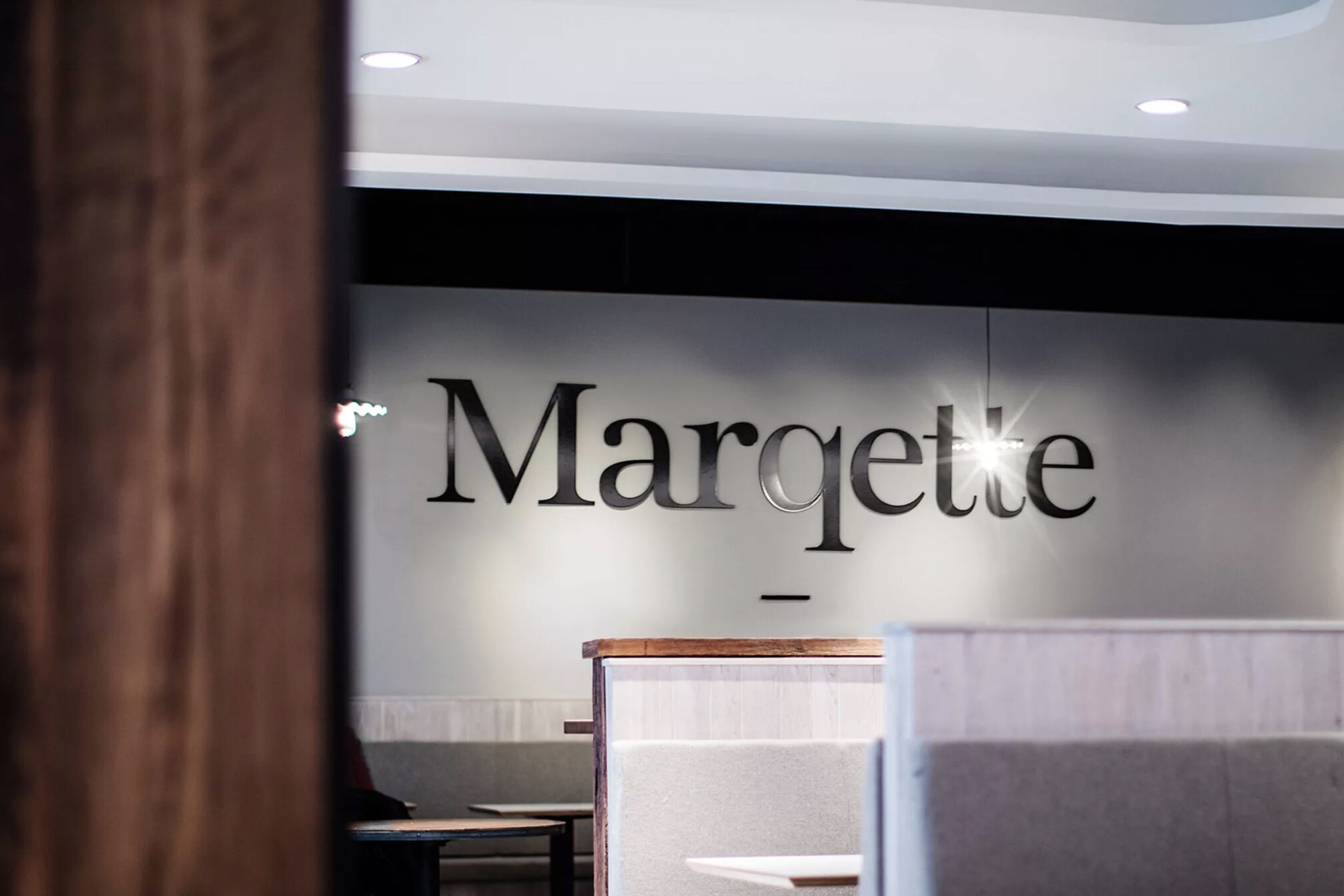Marqette wall sign seated area
